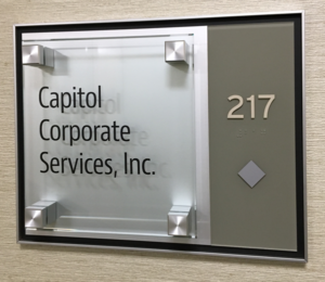 ada sign with glass panel