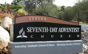 Curved aluminum monument